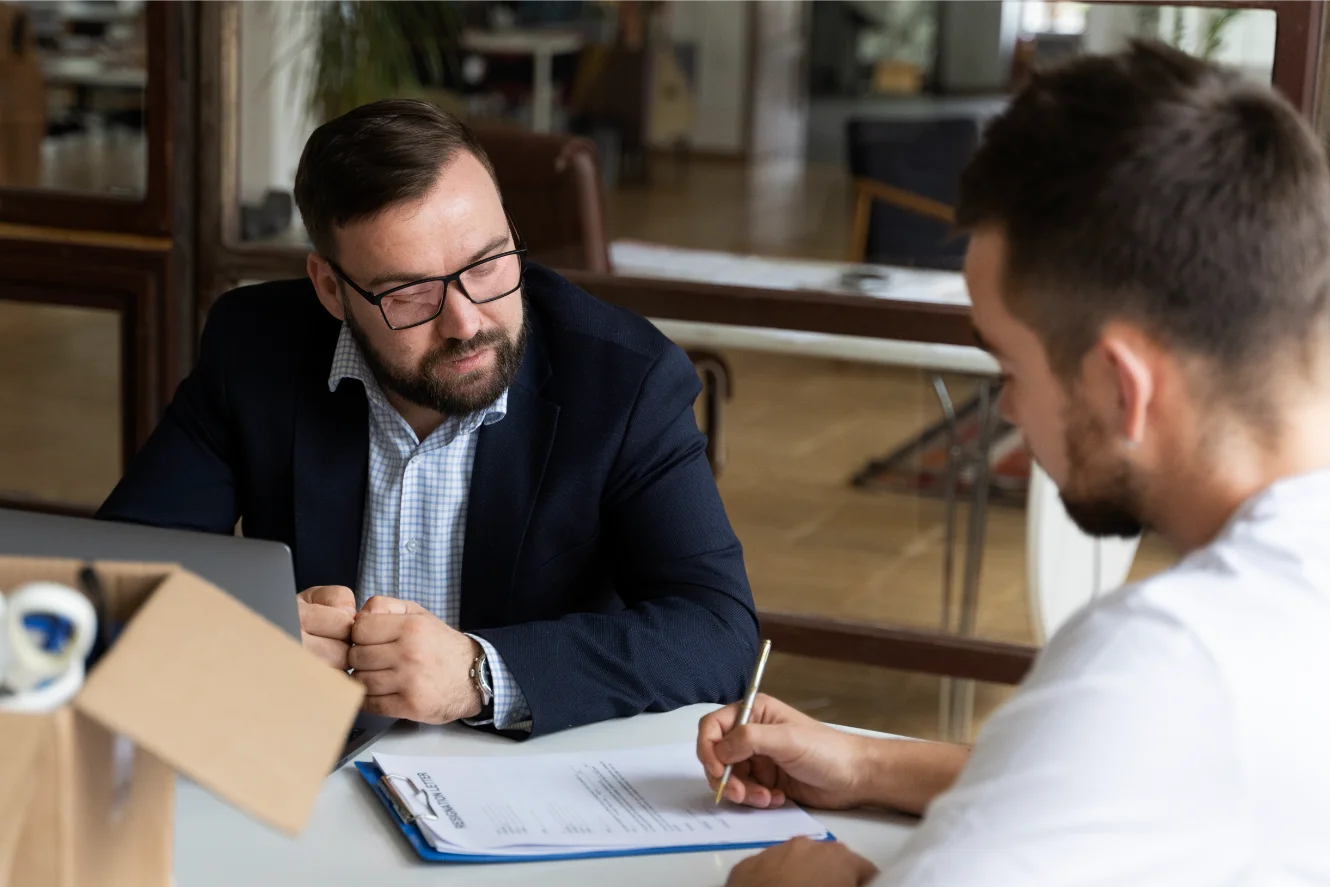 Attorney assisting client with financial paperwork